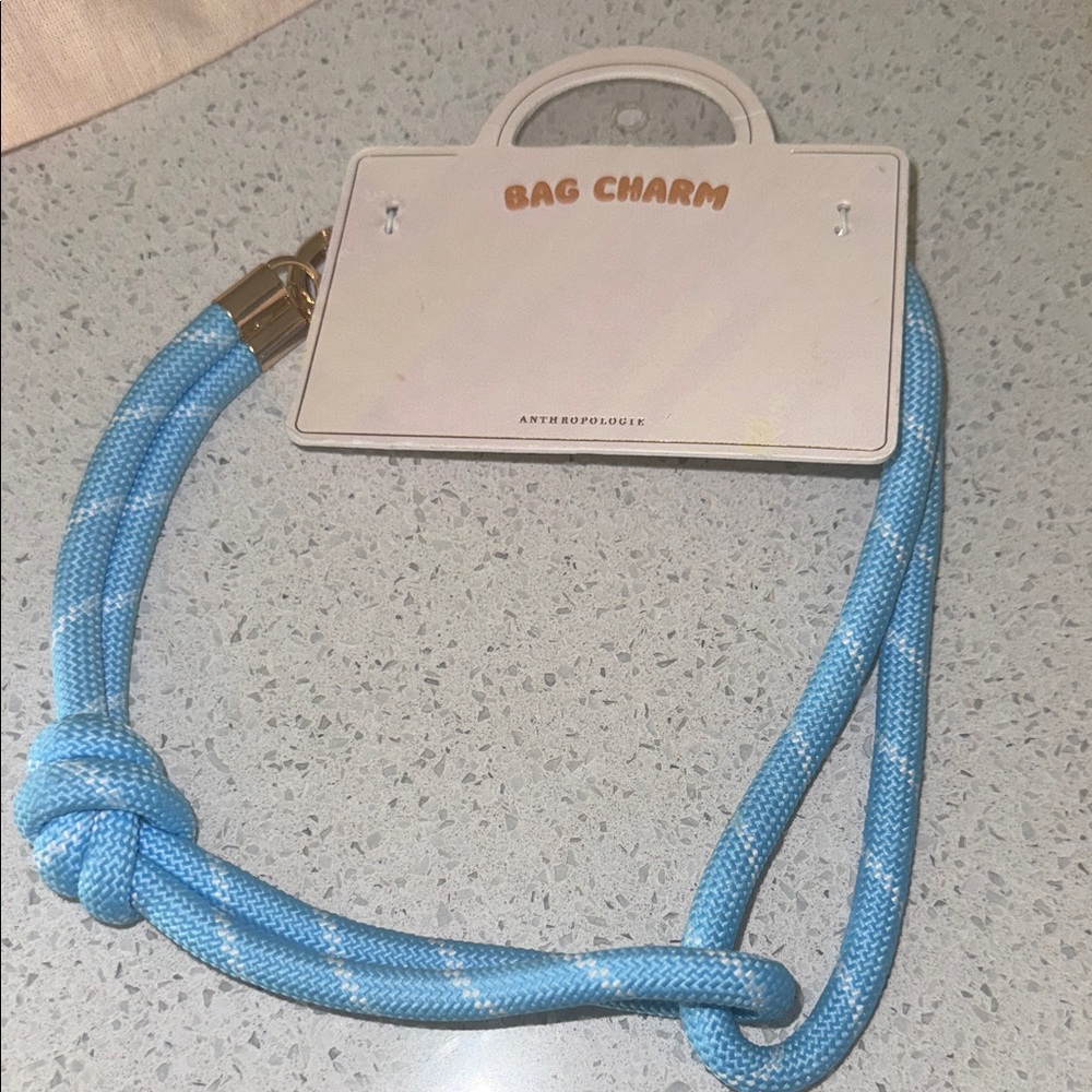 Anthropologie Cream and Blue Bag Charm